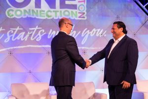 Then-TMA Chair Matthew English, CTP presents TMA member Allen Kadish with the 2022 TMA Chair's Award.